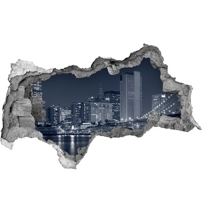 3D sticker gat in stenen muur De skyline van New York door een gat in de muur.