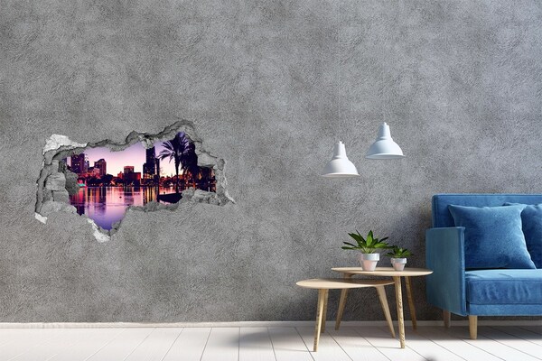 3D muursticker gescheurde muur Zonsondergang boven de stad