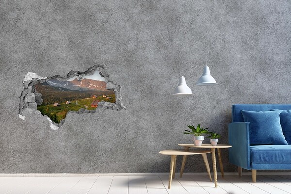 3D sticker gat in stenen muur Bergdal met hutten
