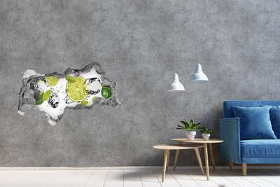 3D sticker gat in stenen muur Een verfrissende cocktail met limoen.