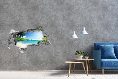 Zelfklevende 3D wandsticker illusie Caribisch strand door een gat in de muur