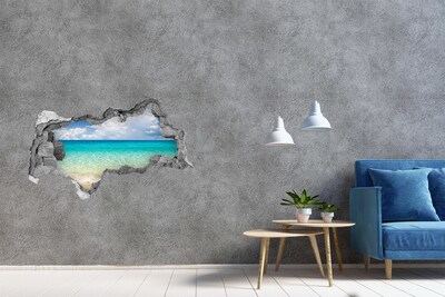 Zelfklevende 3D wandsticker illusie Caribisch strand door een gat in de muur