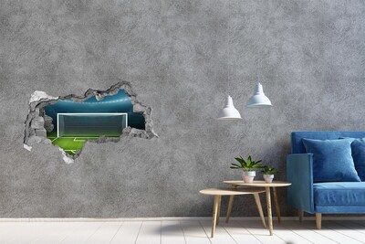 tegelstickers wc Het voetbalstadion achter het gat in de muur.