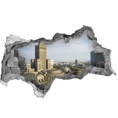 Wandsticker 3D doorkijk Uitzicht op Warschau vanuit een gat in de muur.