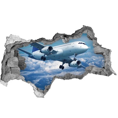 3D sticker gat in stenen muur Aankomst van een vliegtuig in de wolken