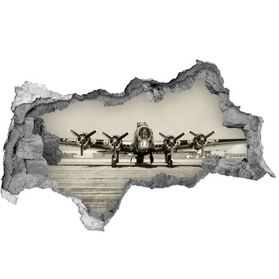 3D muursticker gescheurde muur Een oud vliegtuig op het vliegveldplatform.