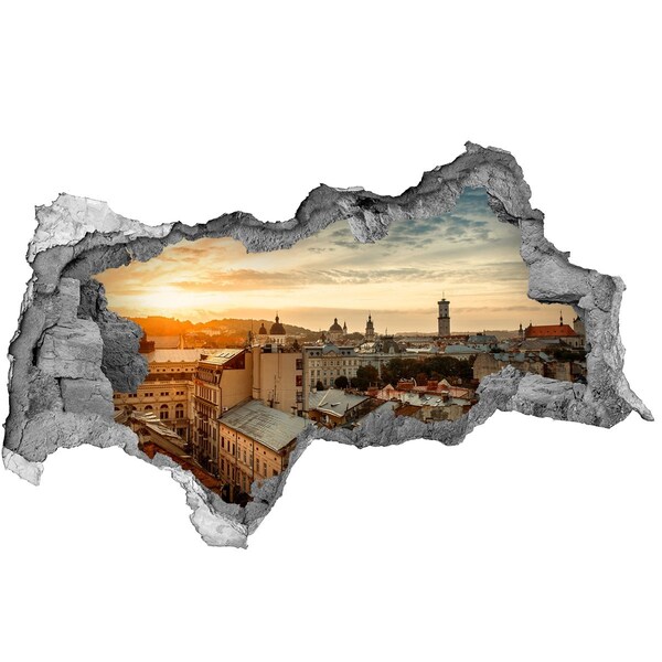 3D sticker gat in stenen muur Zonsondergang boven de stad