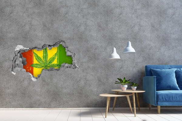 3D muursticker gescheurde muur Groen cannabisblad op een geel-rood-groene achtergrond