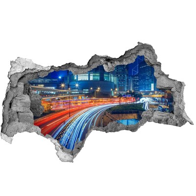 Fototapeta dziura na ścianę 3d Nowoczesne miasto w nocy