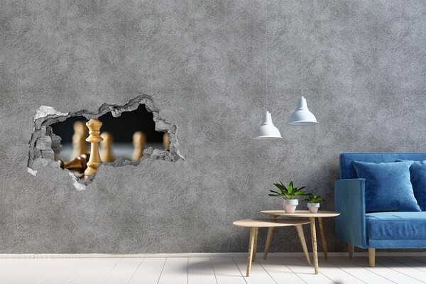 Foto zdjęcie dziura na ścianę Gra w szachy przez dziurę w ścianie