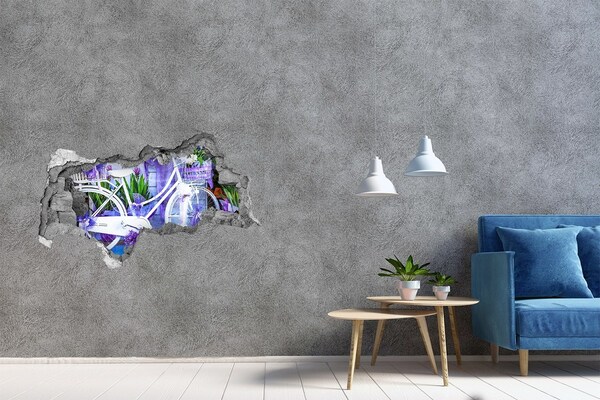 3D sticker gat in stenen muur Een fiets in een bloemrijke omgeving.
