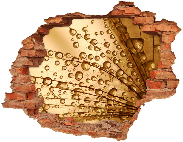 trapstickers Een gouden druppel op een betonnen achtergrond