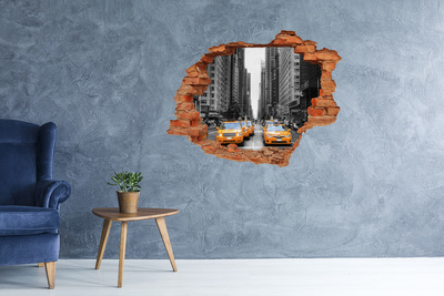 Foto zdjęcie dziura na ścianę Nowojorskie taksówki w miejskim krajobrazie