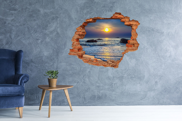 Vinyl muursticker 3D breekeffect Zonsondergang boven de zee