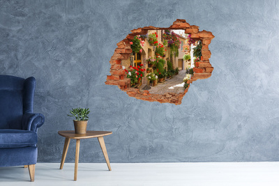 Grote 3D muursticker gat in de muur Een charmante straat met bloemen