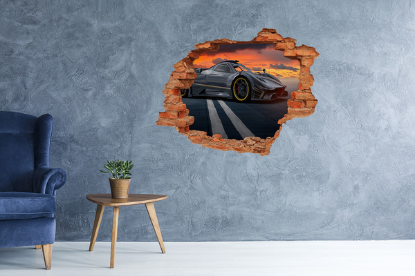 Vinyl muursticker 3D breekeffect Een raceauto op het circuit.