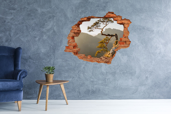 Grote 3D muursticker gat in de muur Berglandschap met een boom