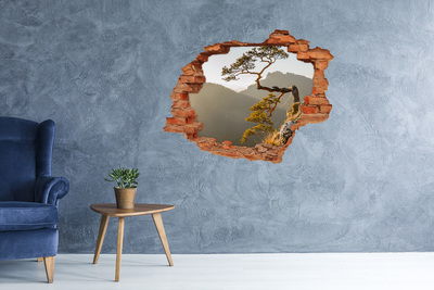 Grote 3D muursticker gat in de muur Berglandschap met een boom