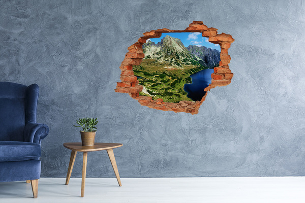 Grote 3D muursticker gat in de muur Berglandschap met een meer