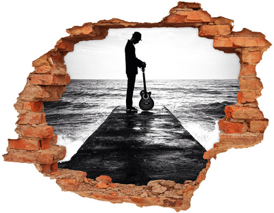 Grote 3D muursticker gat in de muur Muzikant op de pier