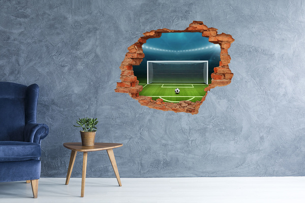 Vinyl muursticker 3D breekeffect Het voetbalstadion achter het gat in de muur.