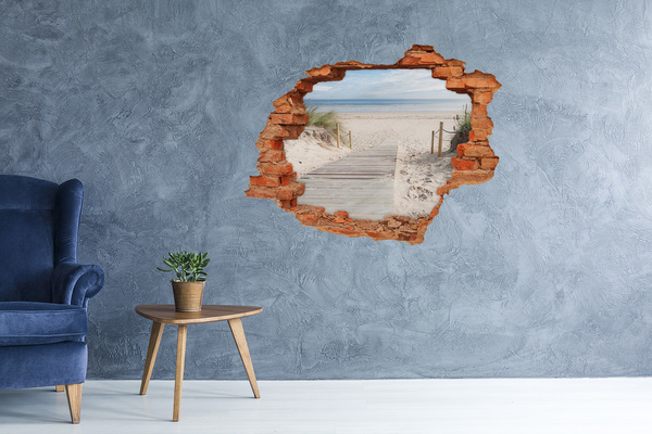Grote 3D muursticker gat in de muur Een mysterieus strand met een houten pier.