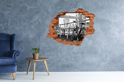 Fototapeta dziura na ścianę 3d Bicykl przy miejskim nabrzeżu