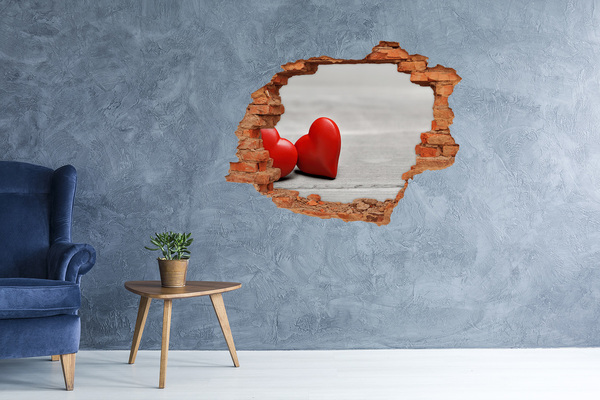 Vinyl muursticker 3D breekeffect Hart in een gat in de muur
