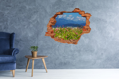 Grote 3D muursticker gat in de muur Bloemrijk berglandschap