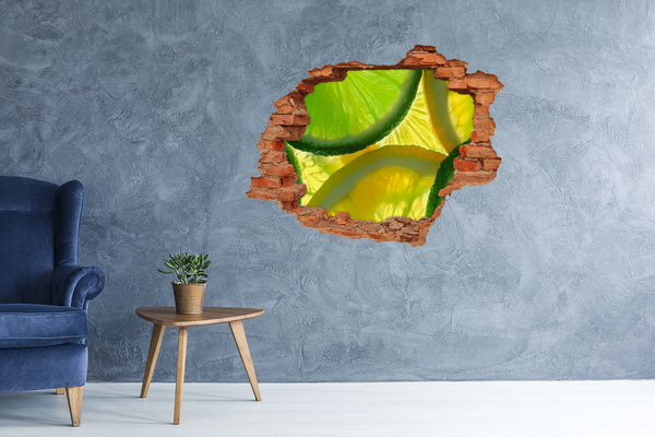 Vinyl muursticker 3D breekeffect Groene limoen in een gat in de muur