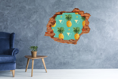 Grote 3D muursticker gat in de muur Ananassen op een turquoise achtergrond