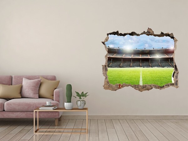 Fototapeta dziura na ścianę 3d Stadion piłkarski zza muru