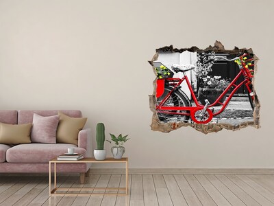 Zelfklevende muursticker 3D gat Een rode fiets in een stedelijke omgeving