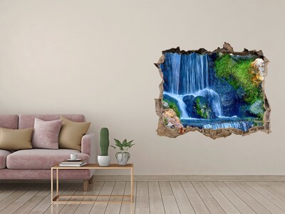 Wandsticker 3D gat met uitzicht Een waterval in een groene omgeving