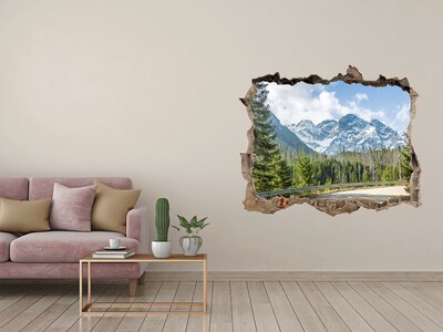 Wandsticker 3D gat met uitzicht Berglandschap achter het gat in de muur