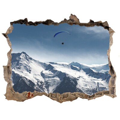 Wandsticker 3D gat met uitzicht Berglandschap met een paraglider