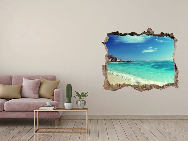 Wandsticker 3D doorkijk Caribisch strand door een gat in de muur