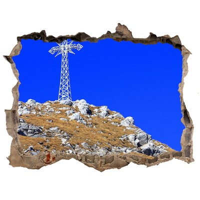 Zelfklevende 3D wandsticker illusie Berglandschap door een gat in de muur