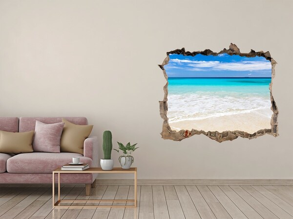 Zelfklevende 3D wandsticker illusie Caribisch strand door een gat in de muur