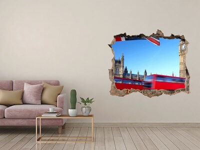 Wandsticker 3D gat met uitzicht De skyline van Londen met een rode bus.