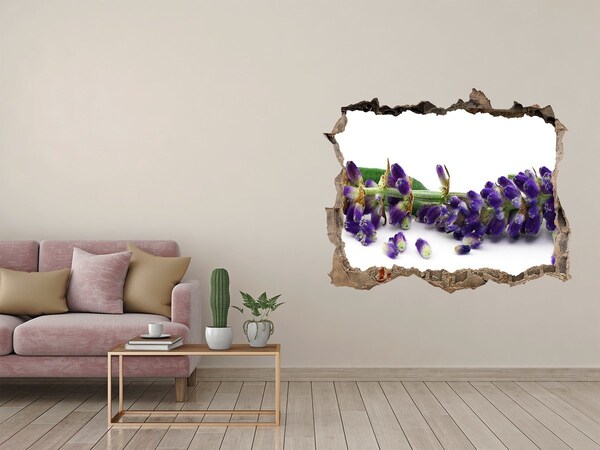 Wandsticker 3D gat met uitzicht Een lavendelbloem door een gat in de muur.