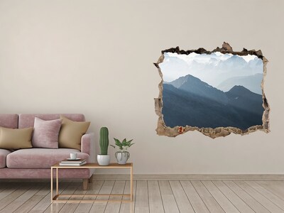 Zelfklevende 3D wandsticker illusie Berglandschap door een gat in de muur