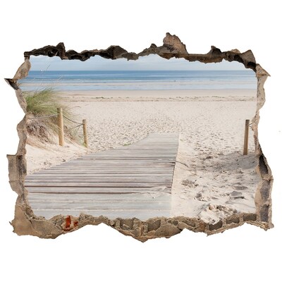Wandsticker 3D gat met uitzicht Een mysterieus strand met een houten pier.