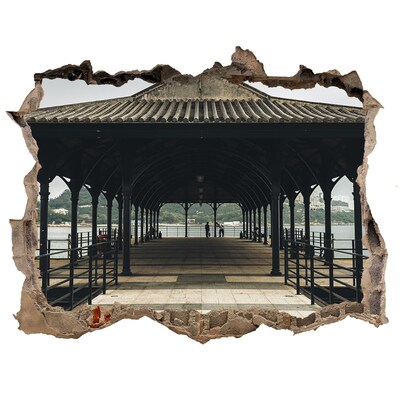 Zelfklevende muursticker 3D gat Uitzicht op de pier vanaf het water.