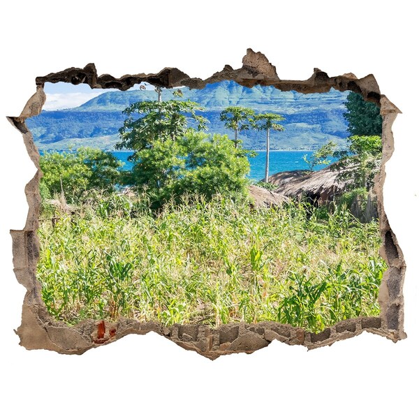 Zelfklevende 3D wandsticker illusie Tropisch landschap achter het gat in de muur