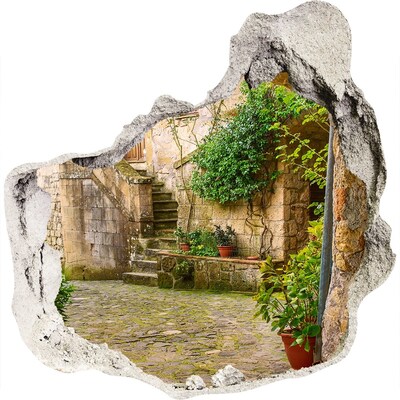 Zelfklevende muursticker 3D gat Een charmante binnenplaats in de oude stad.