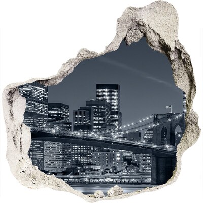 3D muursticker effect gat in de muur Nachtzicht op de stad met een brug