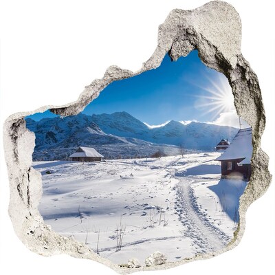 3D muursticker effect gat in de muur Winters berglandschap