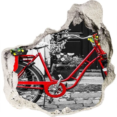 3D muursticker effect gat in de muur Een rode fiets in een stedelijke omgeving