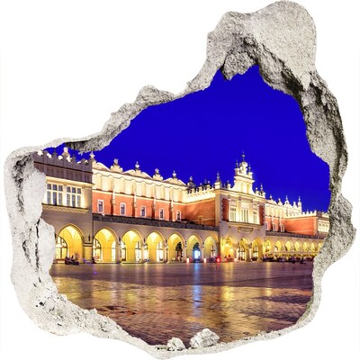 3D wandsticker gat in de muur Het Grote Marktplein van Krakau 's nachts